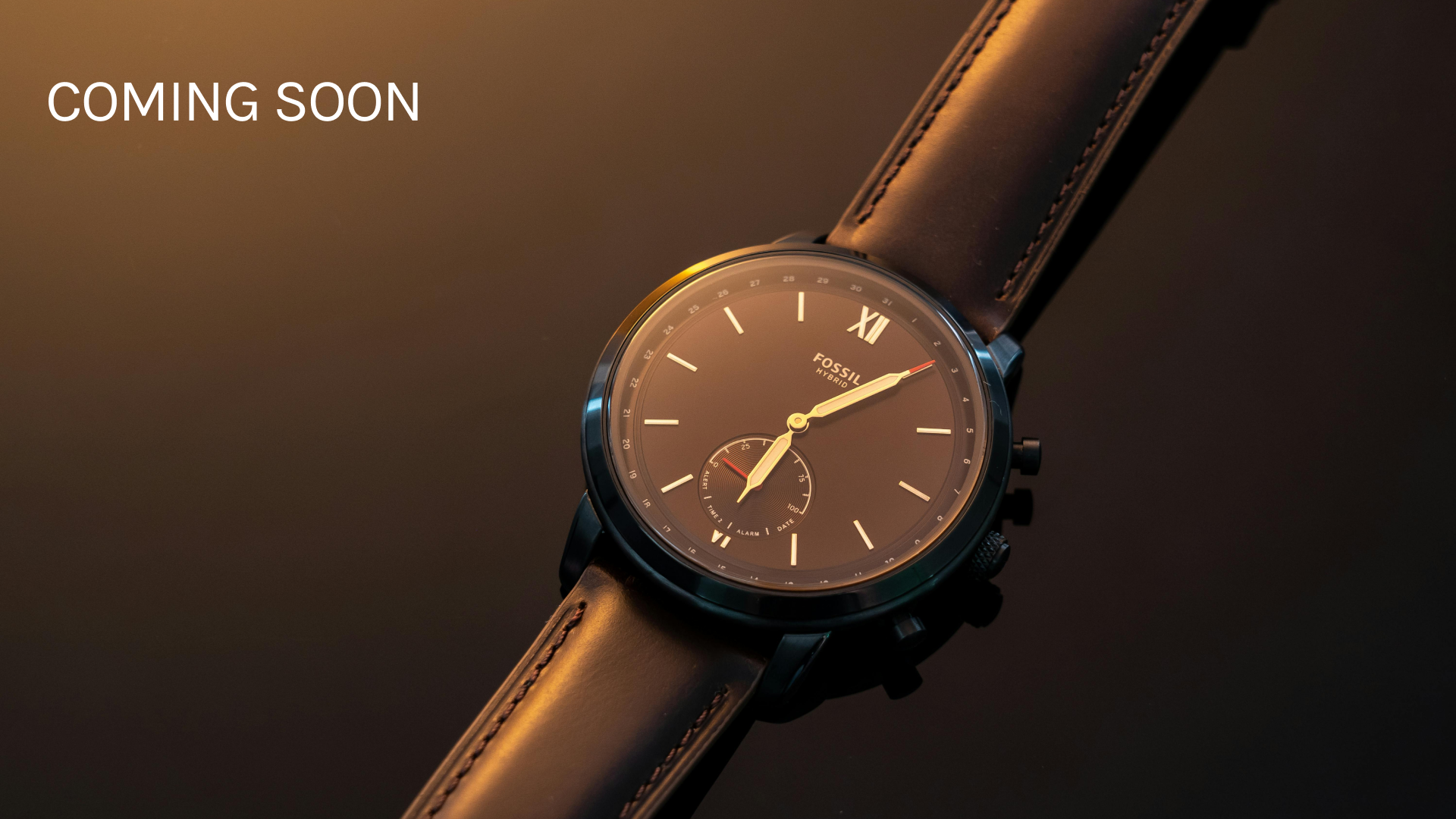 Wristwatch with a brown leather strap and dark face on a gradient background, 'COMING SOON' text at the top.