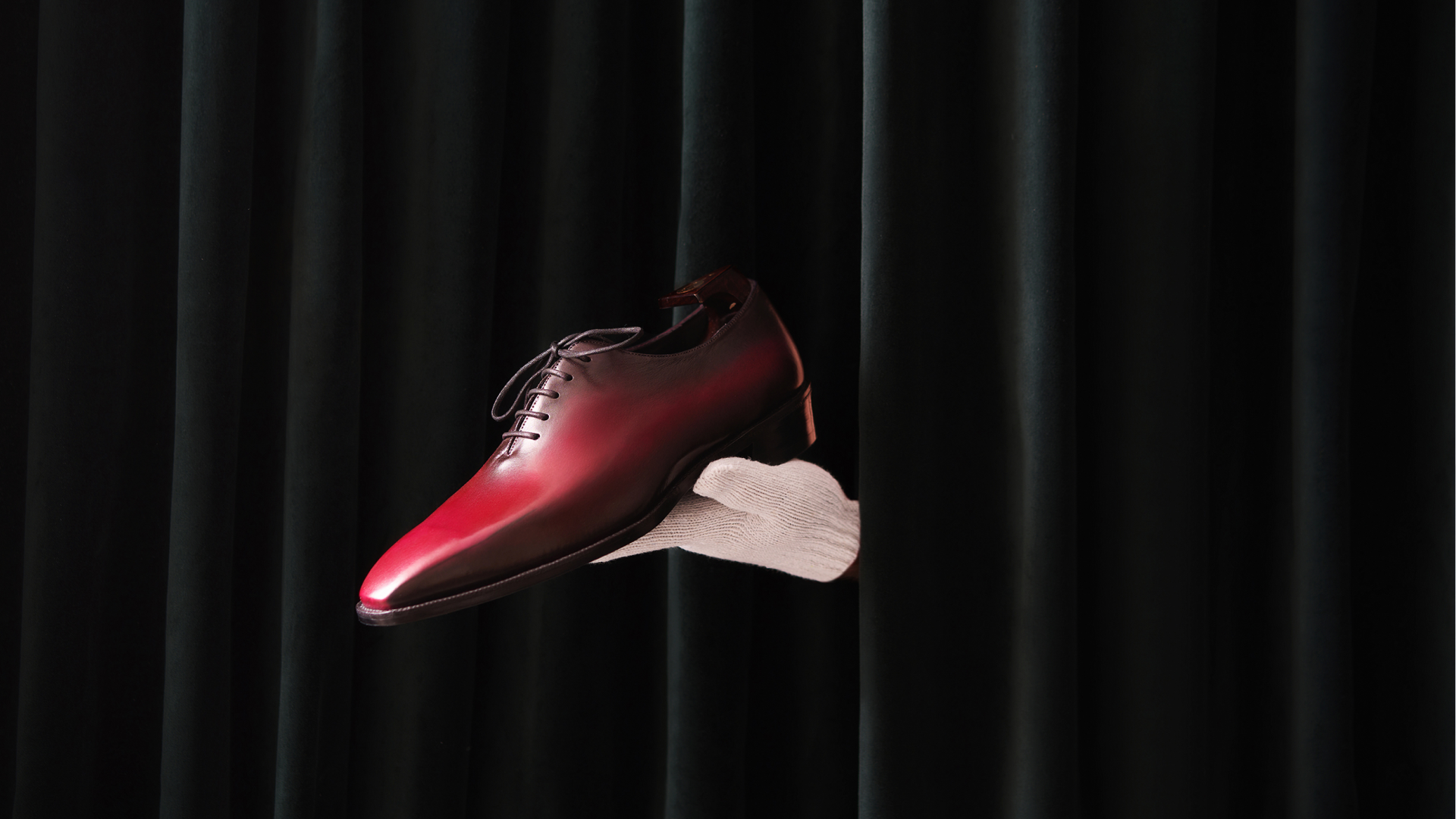 Red shoe on a black background