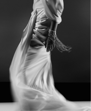 Person in flowing robes.